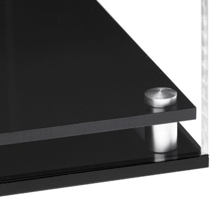 Closeup image of the corner of the black modern base, showing the acrylic and the stainless steel corner support