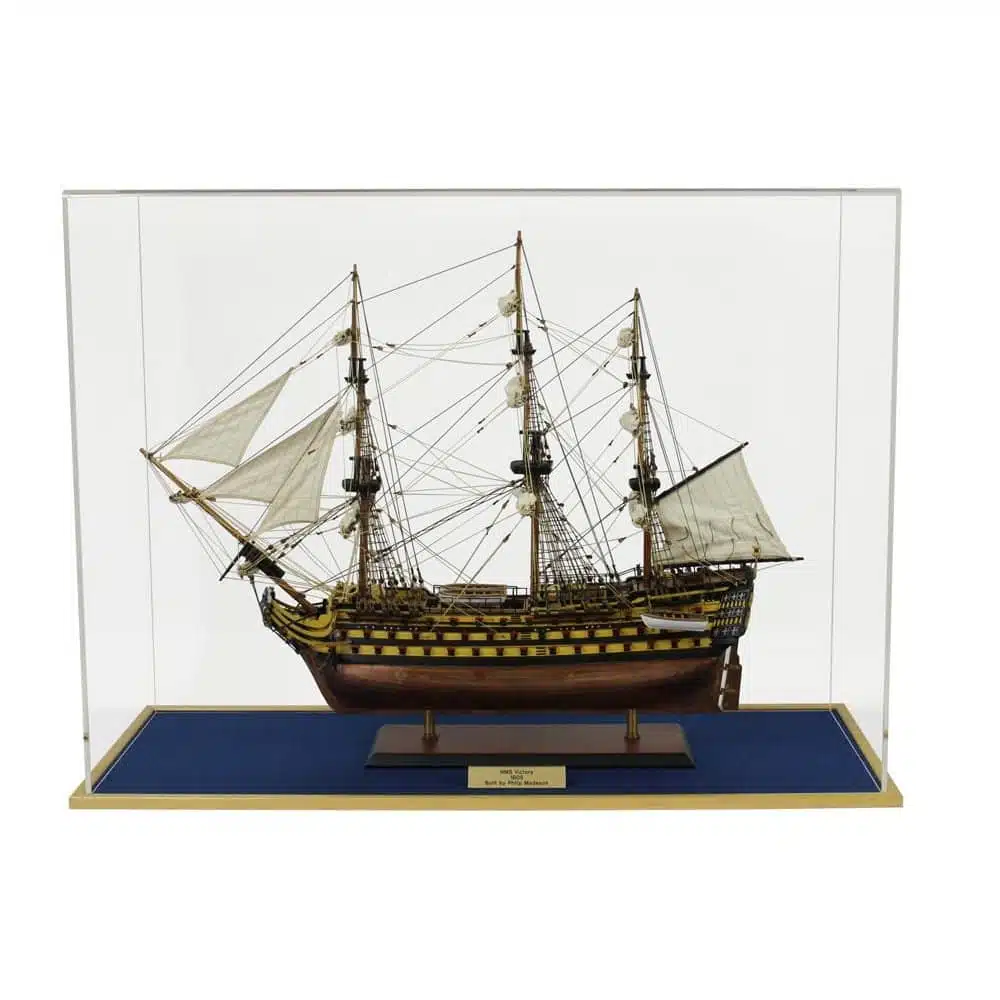 Main image of the Acrylic Model Ship Display Case, shown inside the display case is a model of HMS Victory, shown with a black wooden base.