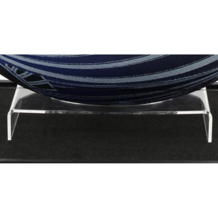 Acrylic rugby ball display stand shown with a rugby ball on it