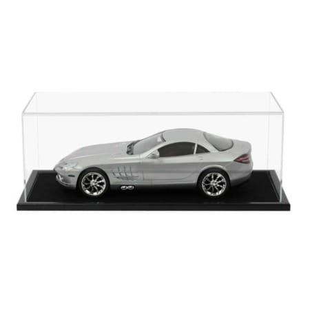 A grey 1:12 scale model diecast car displayed inside our acrylic display case with wooden base