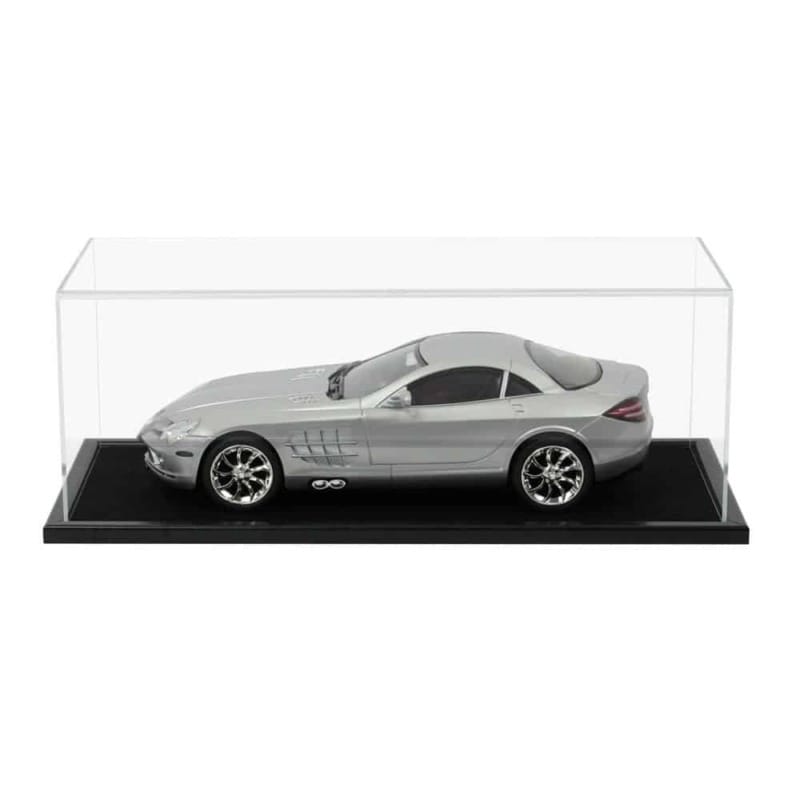 A grey 1:12 scale model diecast car displayed inside our acrylic display case with wooden base