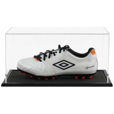 A single football boot displayed inside our acrylic display case with wooden base