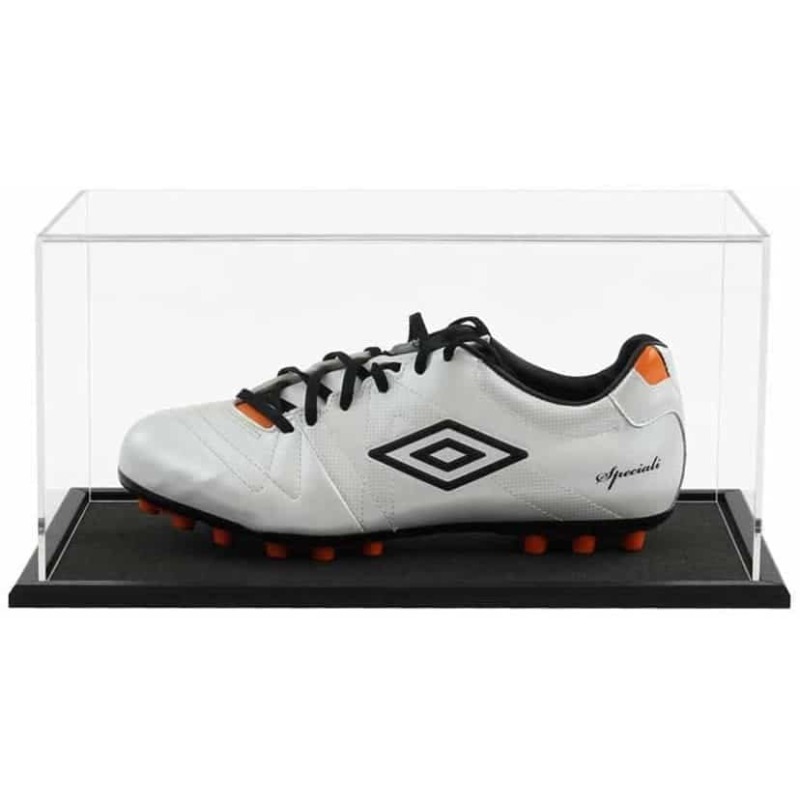 A single football boot displayed inside our acrylic display case with wooden base